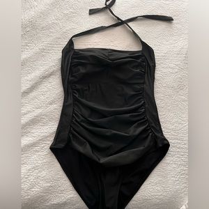 Black full coverage one piece bathing suit